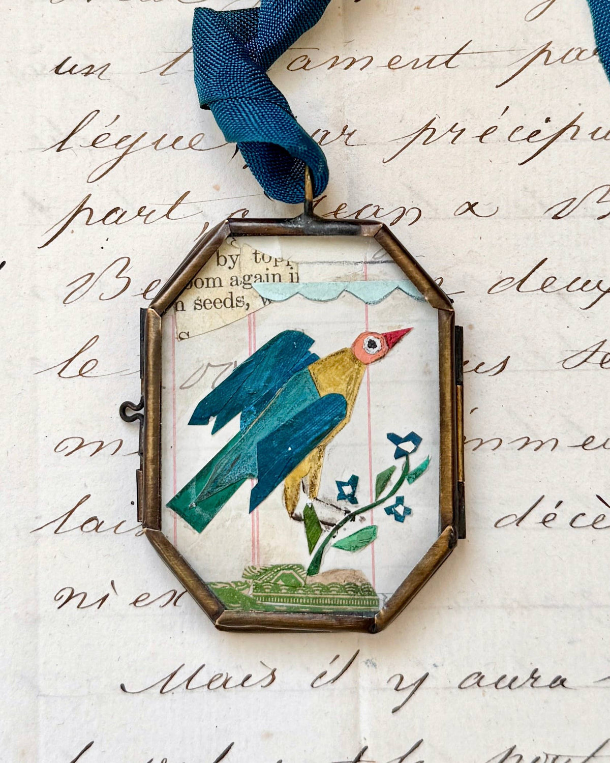 Maris Mirum Cassis Folk Bird art locket by Brandie Stonge