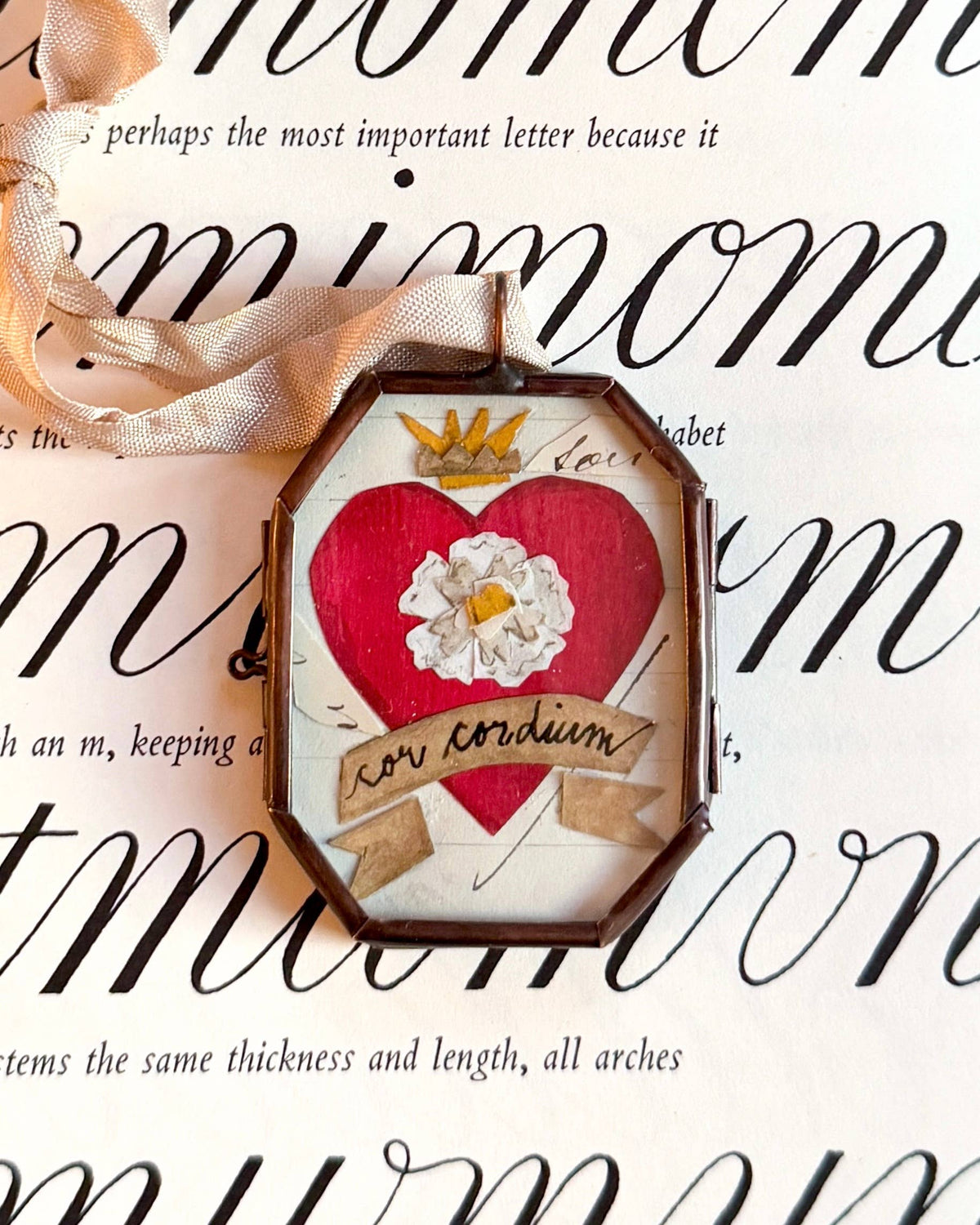 Maris Mirum Cor Cordium art locket by Brandie Stonge