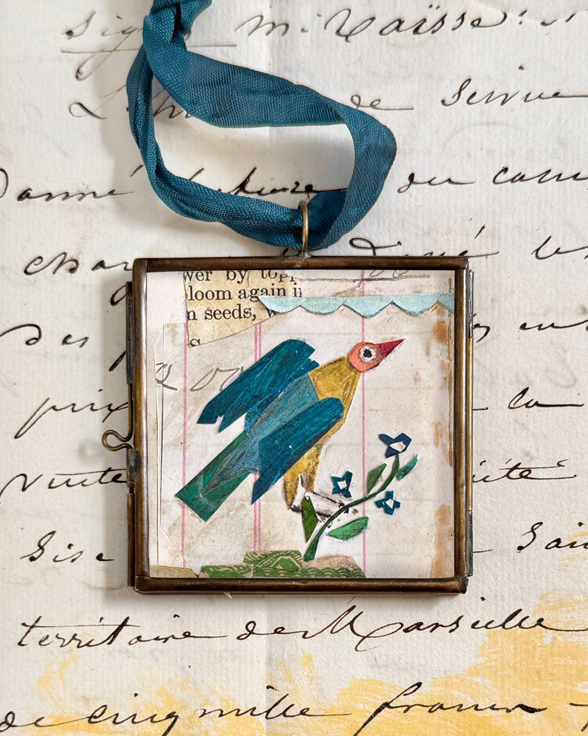 Maris Mirum Cassis Folk Bird art locket by Brandie Stonge