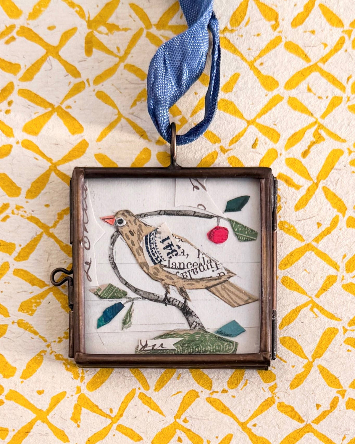Maris Mirum Cerise Folk Bird art locket by Brandie Stonge