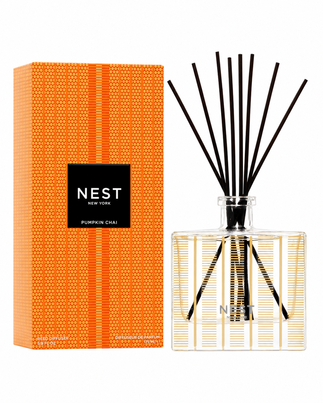 NEST Pumpkin Chai Reed Diffuser with orange gift box on a white background